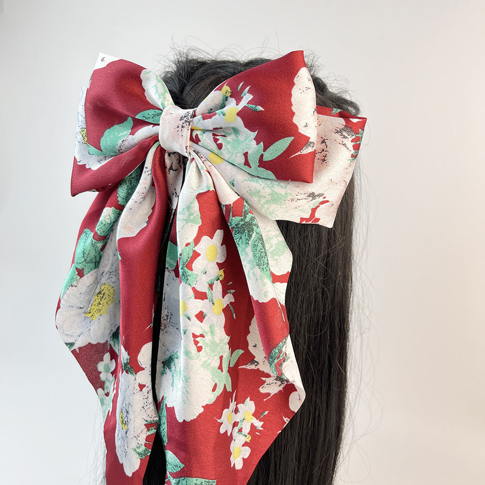 Wholesale Retro Camellia Red Big Bow Long Floating Hair Clip